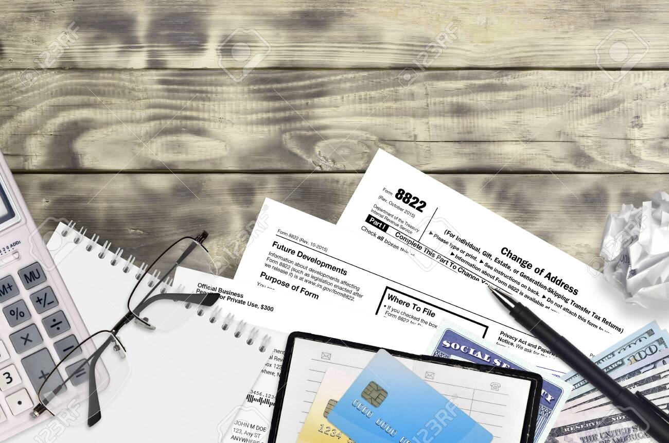 IRS Form 8822 Change Of Address Lies On Flat Lay Office Table And Ready To Fill U S Internal Revenue Services Paperwork Concept Time To Pay Taxes In United States Top View Stock